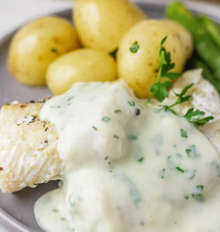 Poached Fish in a white parsley sauce